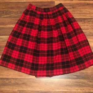 Women’s plaid midi A-line skirt.